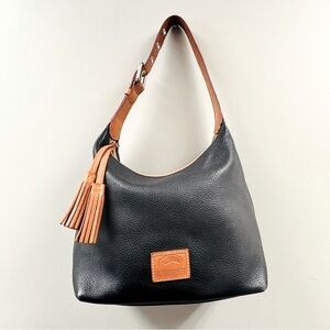 Dooney & Bourke Black and Tan Leather Hobo Bag Tassel Detail, Classic Two‑Tone